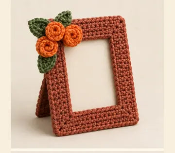 Marco con flores a crochet, imagen ilustrativa