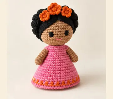 Muñeca con trenzas a crochet, imagen ilustrativa